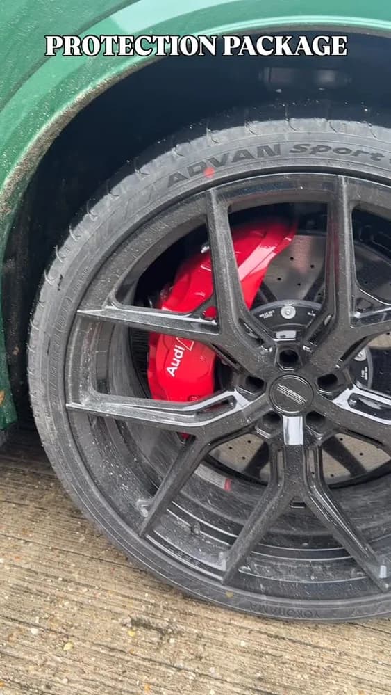 Detailed alloy wheel and red brake caliper after a deep clean